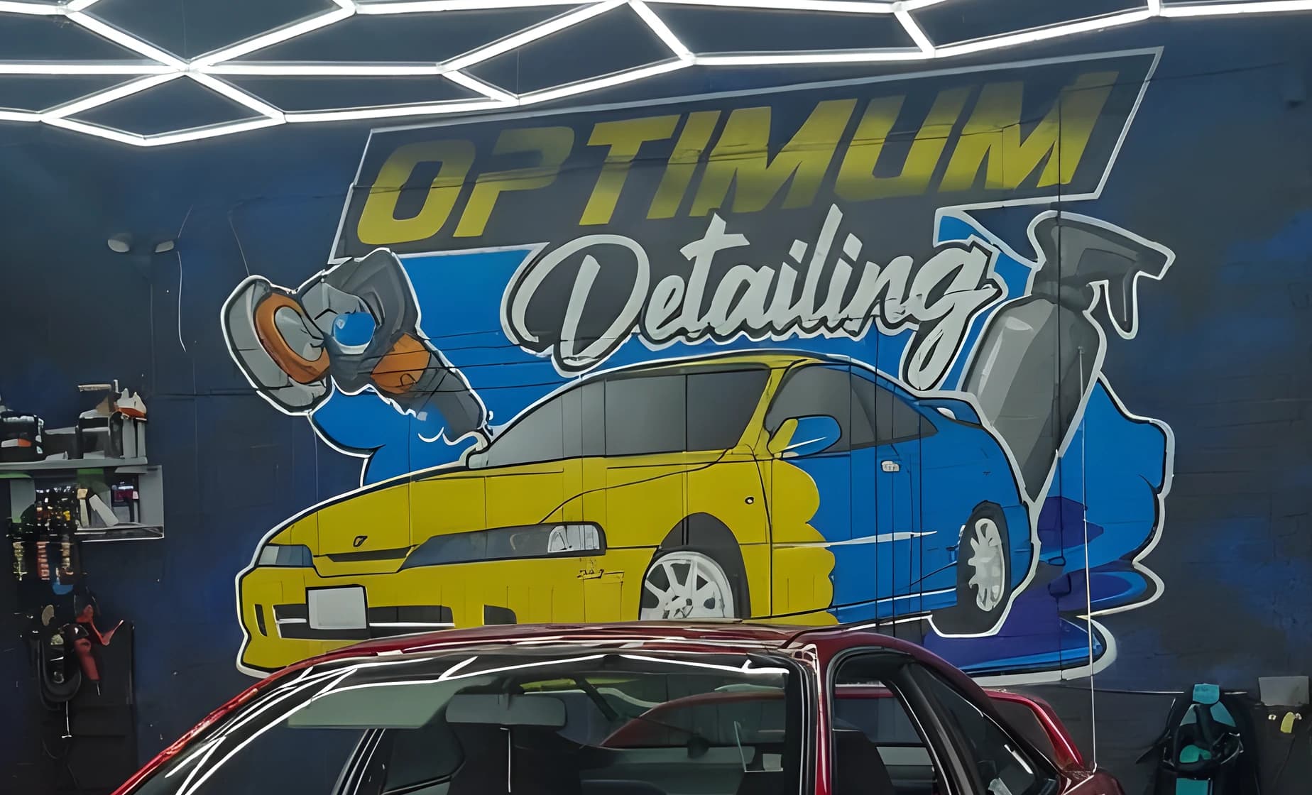The Optimum Detailing mural inside the Leicester studio